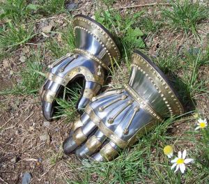 My gauntlets.  Oh, and the Captain's, too.  Hardened steel, my motto (Geoffrey de Charny's) engraved on the cuff band.  Light as air, strong as faith.